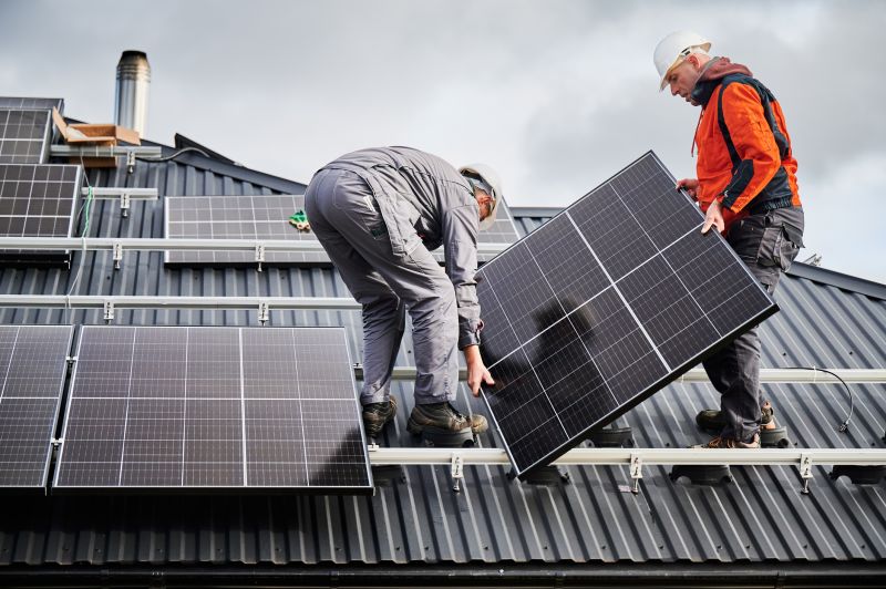 Professional solar installer working on a rooftop